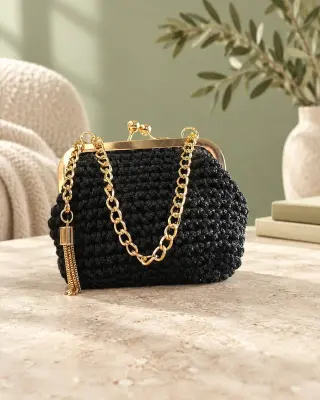 حقيبة يد كروشيه سوداء بخيط المكرمية في وادي الذهب بحمص