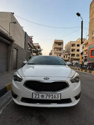 كيا K7 2016 بيضاء بمحرك 220 حصان وسقف بانورامي في الغوطة بحمص