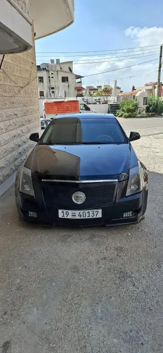 كاديلاك CTS موديل 2011 أسود بفتحة بانوراما ومقاعد مدفأة في النضال