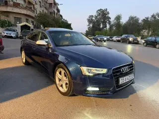 أودي A5 سيدان 2014 زرقاء بمحرك 2.0 توربو وفتحة سقف في العدوي