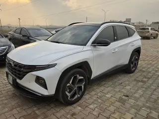 هيونداي توسان 2022 كروس أوفر أوتوماتيك أبيض بسقف بانورامي في حلب الجديدة