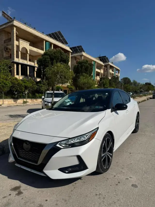 نيسان سنترا SR 2021 بيضاء أوتوماتيك بممشى 14,200 كم في سيف الدولة بحلب