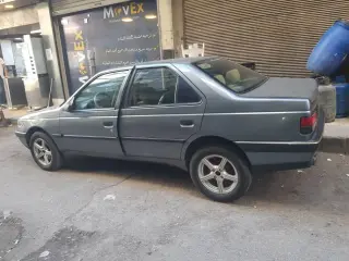 بيجو سيدان فضية 2004 بمحرك بنزين 1400 سي سي في حلب