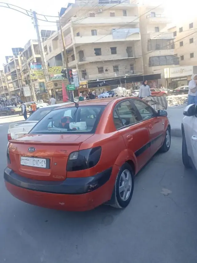 كيا ريو سيدان حمراء 2006 أوتوماتيك بمحرك 1600 سي سي في الفرقان حلب