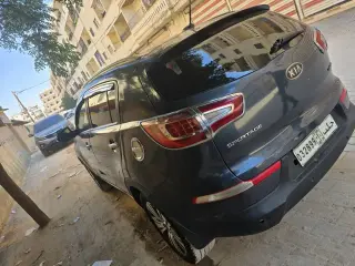 كيا سبورتاج دفع رباعي فضية موديل 2012 بمحرك بنزين في حلب