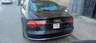 أودي A8L موديل 2016 سوداء بفتحة بانوراما وجلد كريمي في حلب