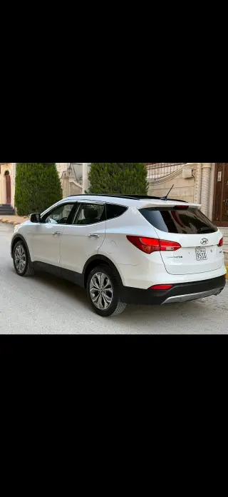 هيونداي سانتافي 2018 أوتوماتيك أبيض للإيجار اليومي في السليمانية بحلب